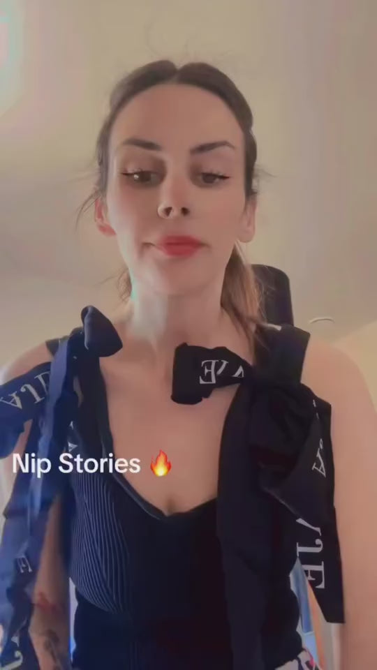 Load video: woman showing nip stories nipple covers in action